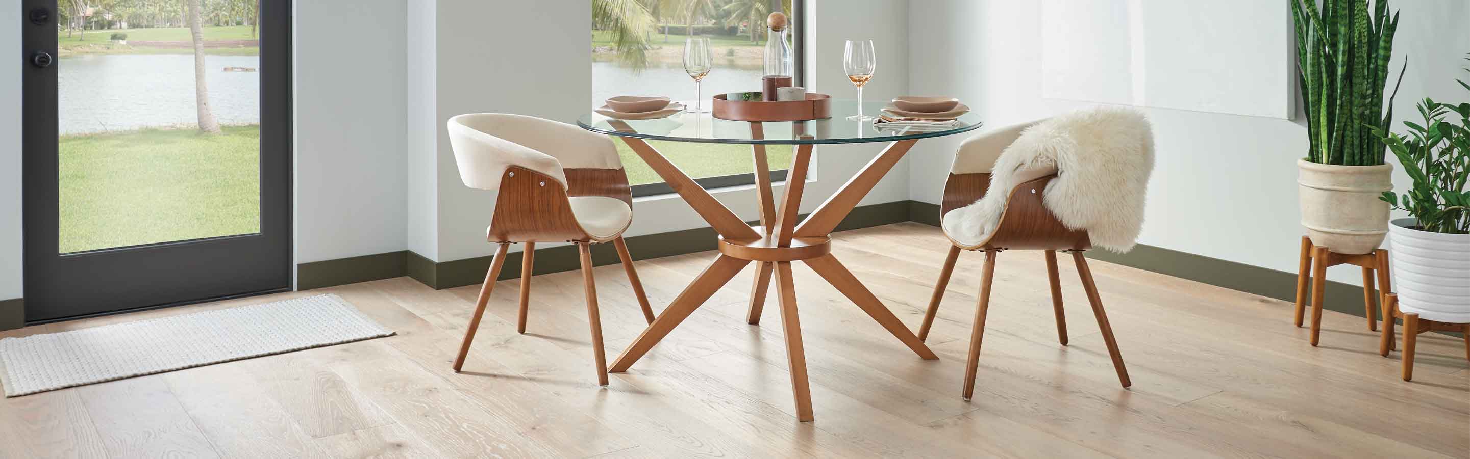 Dining room with hardwood floors and round table